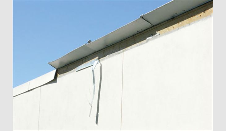 This cleated metal edge flashing partially lifted during a storm. Typically, when an edge flashing lifts, it causes a progressive lifting and peeling failure of the roof membrane. This weak edge flashing easily could have been detected by an experienced investigator. 