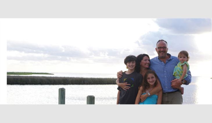 Kelly with his wife, Rebecca; son, Jacob; and daughters, Sarah and Lucy, in Cape Hatteras, N.C.
