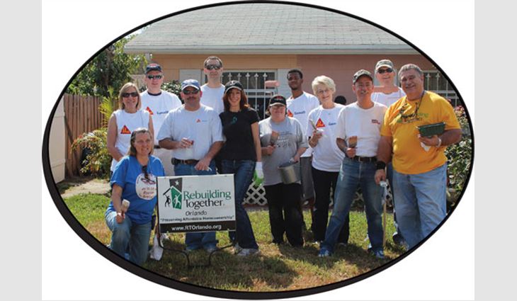 Volunteers helped renovate three homes during the International Roofing Expo's annual Community Service Day. 