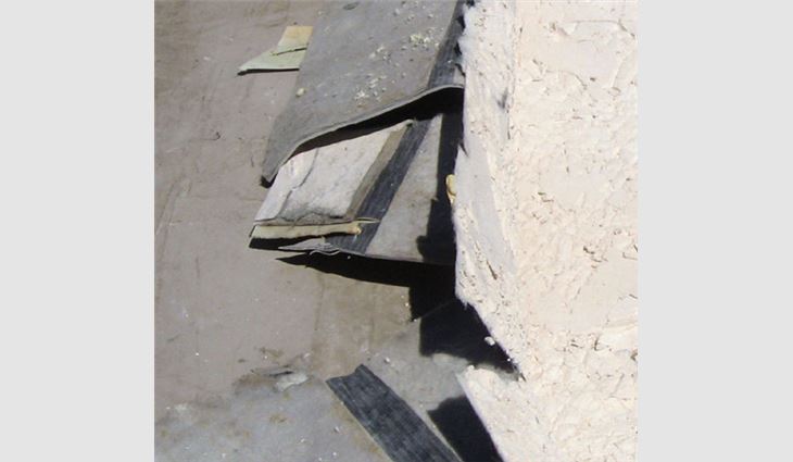 Deterioration in a gypsum-based cover board in a roof system in the Midwest. This roof did not leak.