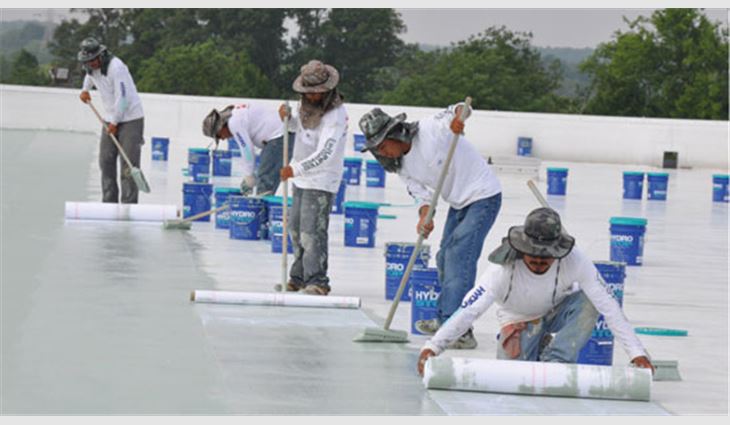 HydroStop workers apply the PremiumCoat System