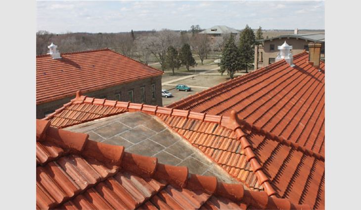 New 20-ounce copper gutters were installed using the original dimensional designer gutter components; an aerial view of the new roof system
