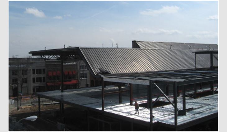 22-gauge interlocking standing-seam galvanized steel panels were installed on the performance hall, mechanical penthouse and a portion of the playground.