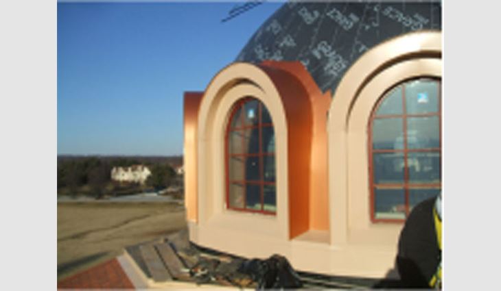 GSM Roofing hand-fabricated the arches for the windows.