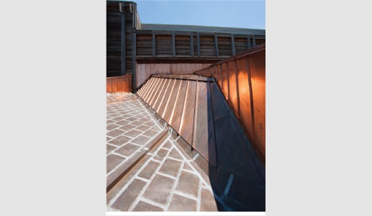 The roof's architecture called for several types of metal roofing material and flashings