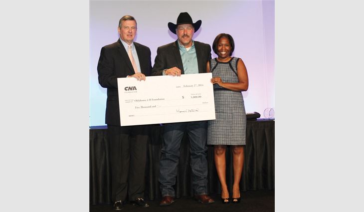 Gerry Shepherd (center), president and chief executive officer of Oklahoma Roofing and Sheet Metal LLC, Oklahoma City, accepts the CNA/NRCA Community Involvement Award from NRCA Executive Vice President Bill Good and Rhonda Lohmar, CNA's consulting underwriting director.