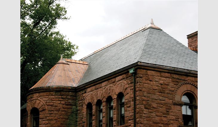 More than 200 squares of slate and multitudes of copper ridge cresting, standing-seam copper roofing, gutters and leaders were installed on Woods Memorial Hall.