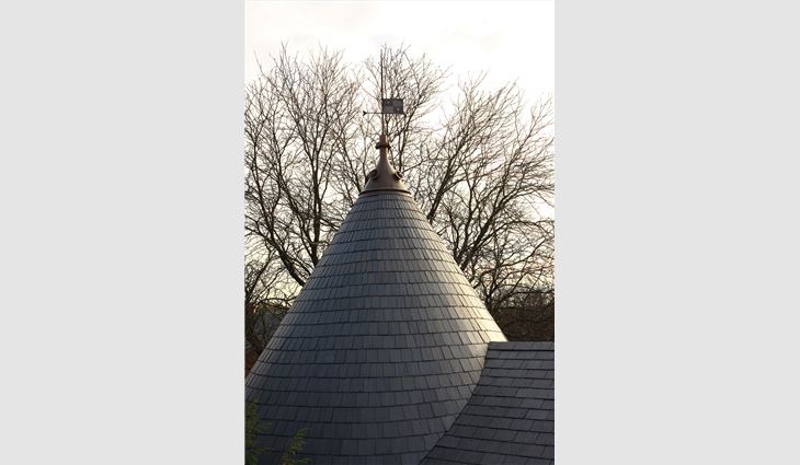Each piece of slate on the Kennedy house's cone-shaped roof was custom-cut to form the curves. 