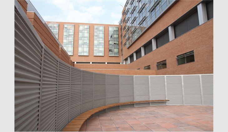 Perforated aluminum screen panels were used on the third and fourth levels.