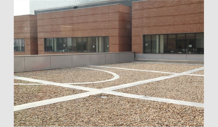 A 19,600-square-foot Travertine terrace paver system was installed on the terraces' inverted roof systems.