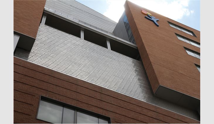 Aluminum composite material sill panels, soffit and column panels were installed on the fifth level.