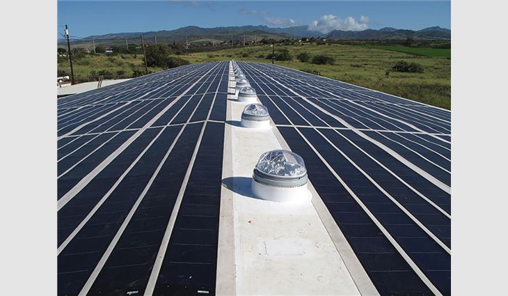 A combination of tubular daylighting devices and skylights provide natural daylight in the Kauai Island Utility Cooperative Port Allen Generating Facility in Eleele, Hawaii.