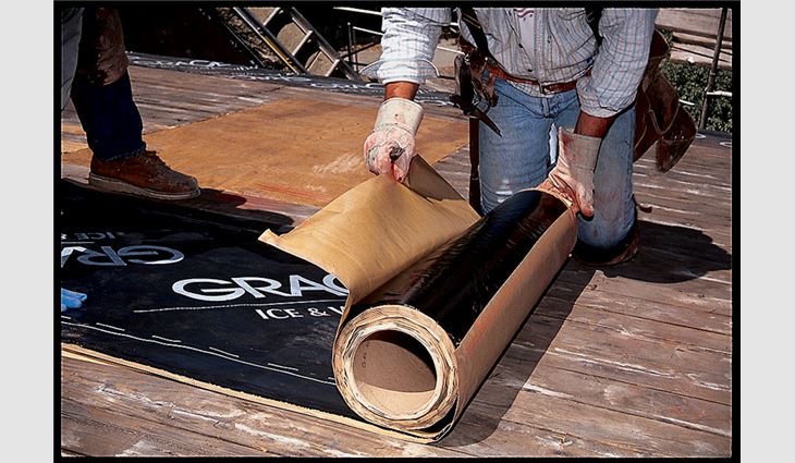Step two of the conventional underlayment installation method: Peel the release liner from the membrane, then press the membrane in place with heavy hand pressure.