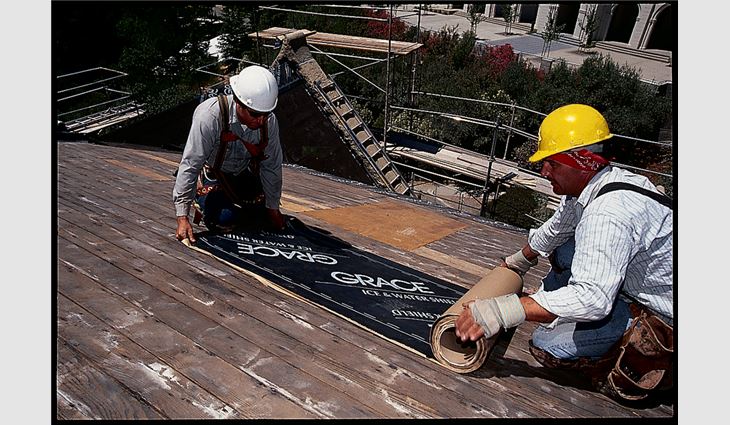 Step one of the back-roll underlayment installation method: Begin by unrolling a 10- to 15-foot piece of membrane, leaving the release liner in place. Align the membrane and roll in the intended direction of the membrane application.