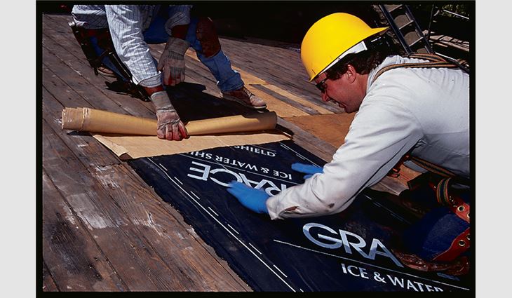 Step six of the back-roll underlayment installation method: When finished with the roll, go back and remove the remaining release liner and smooth the membrane to the edge.