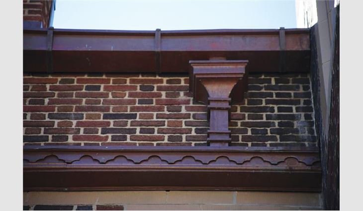 Lower gutters incorporated a triple-scallop design fabricated from flat copper sheets