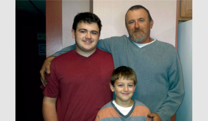 Luck with his sons Shane (left) and Skyler (right)