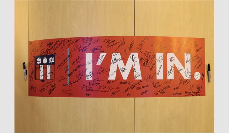 Are you in? NRCA members that stopped by NRCA's booth at the 2015 International Roofing Expo&reg; signed NRCA's banner.