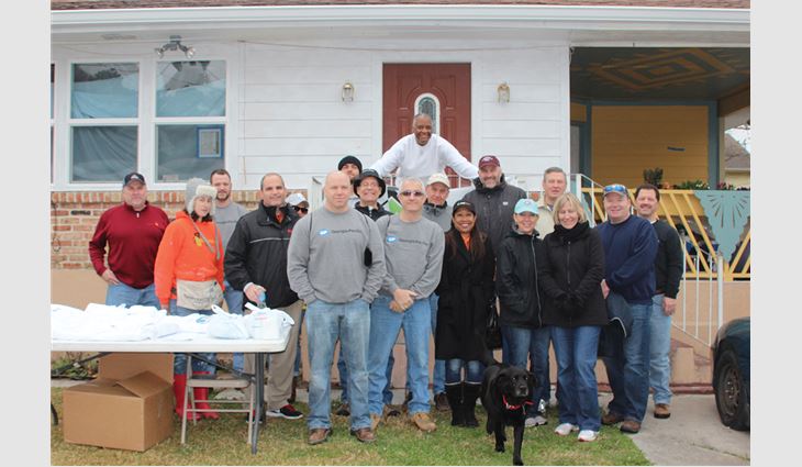 Volunteers helped renovate two homes during Community Service Day.
