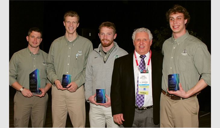 Dennis Conway, principal and vice president of Commercial Roofers Inc., Las Vegas, with students from Colorado State University, winners of The Roofing Industry Alliance for Progress' first Construction Management Student Competition.