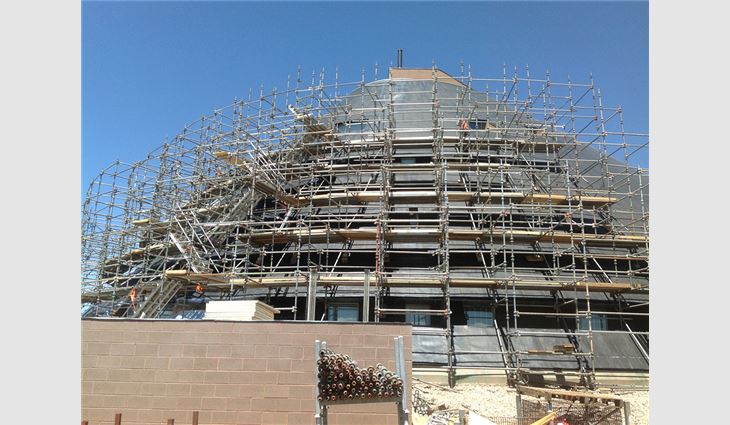 Erecting scaffolding around the cone-shaped structure required 12 men and six weeks to complete.