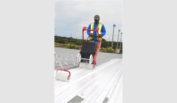 The silicone roof coating then was applied using a single-wide tank spreader. 