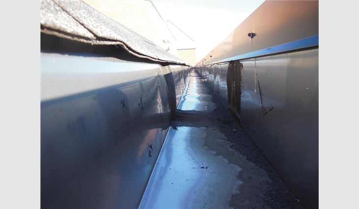 Seam failure on a stainless-steel gutter liner with restricted movement