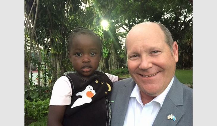 Ribble with Elizabeth Grace, an adopted girl from the Democratic Republic of the Congo whom Ribble helped unite with her family.