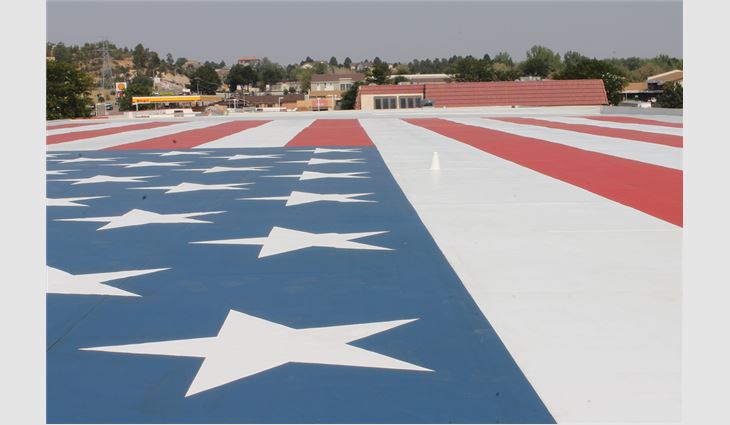 There have been many creative uses of colored single-ply roof membranes during the years, but this TPO roof in Colorado Springs, Colo., stands out as a marvel of craftsmanship. The construction of a 117- by 65-foot U.S. flag is the only one of its size in the world that meets federal specifications.