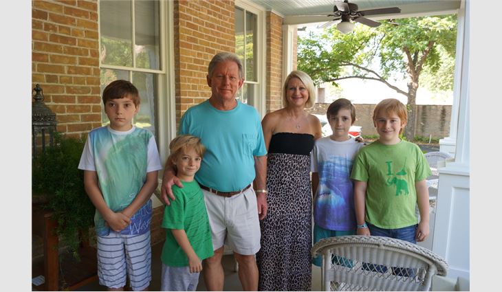 Barr with his wife, Sue, and their grandchildren from left to right: Dylan, James, Beau and Will 