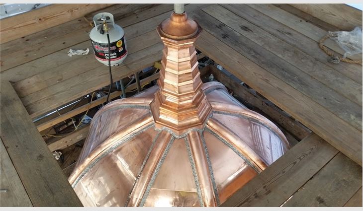 The copper dome was deconstructed and replicated by Mahan Slate Roofing craftsmen.