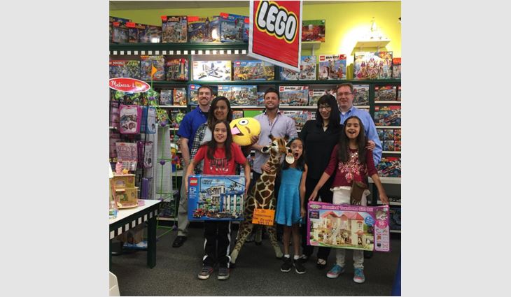 Aloha Construction Inc. organized a shopping spree for local children in need.