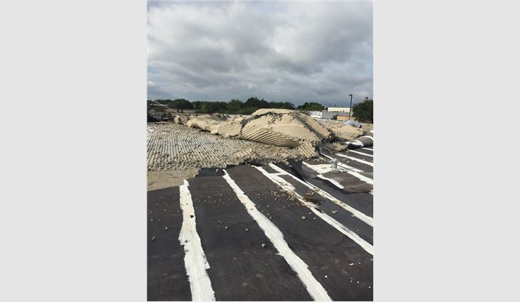 Hurricane Harvey demolished this commercial roof system.