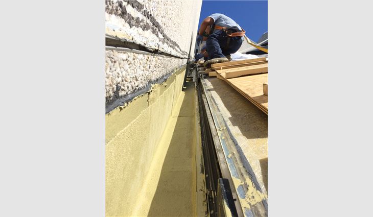 A new liquid-applied reinforced polymer membrane waterproofing system was developed to integrate with the skylights.