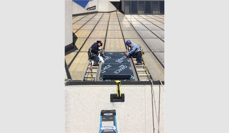 Workers accessed the 12th floor by removing a skylight panel and installing a temporary hatch.