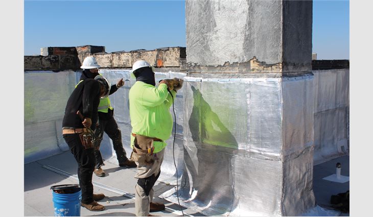Texas Roof Management workers installed a new two-ply polymer-modified bitumen roof system, including metal flashings, repairs to the roof deck and parapet walls, and rebuilding an existing skylight, on Dallas Woman's Forum.