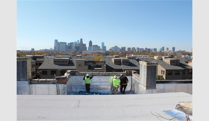 Texas Roof Management workers installed a new two-ply polymer-modified bitumen roof system, including metal flashings, repairs to the roof deck and parapet walls, and rebuilding an existing skylight, on Dallas Woman's Forum.