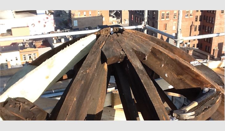 American Roofing and Metal workers replaced some structural members on the cupola and rebuilt the deck.