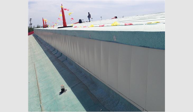 About 10,000 square feet of custom-fabricated flush wall panels were installed over Polyglass Polstick® MTS and 5/8-inch-thick plywood at all existing rise wall conditions.