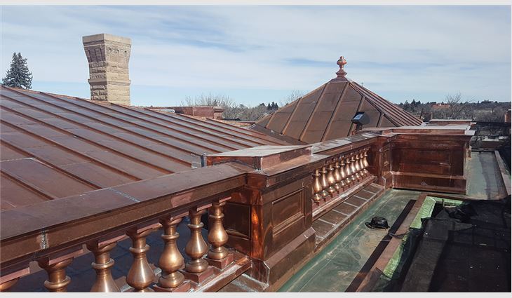 The main roof’s perimeter includes an entablature detailed with a copper balustrade system composed of more than 140 spun-copper balusters in 12 sections.