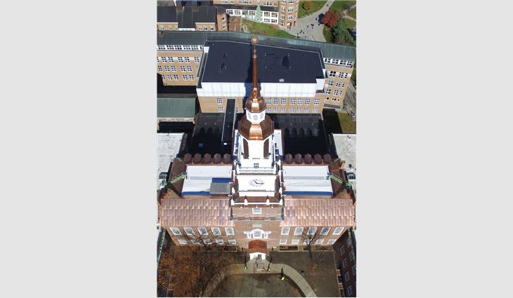 An aerial view of Baker Tower’s newly completed roof systems and copper work.