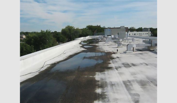 Photo 5: The crickets on this roof are too small for the conditions, leading to ponding water.
