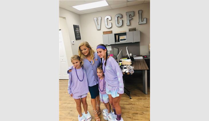 During Domestic Violence Awareness month in October, Venture Construction Group of Florida employees held a Purple Pajama Party fundraising event.