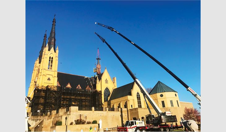 The roof could not withstand scaffolding weight, so the spire was lowered to the ground for restoration.