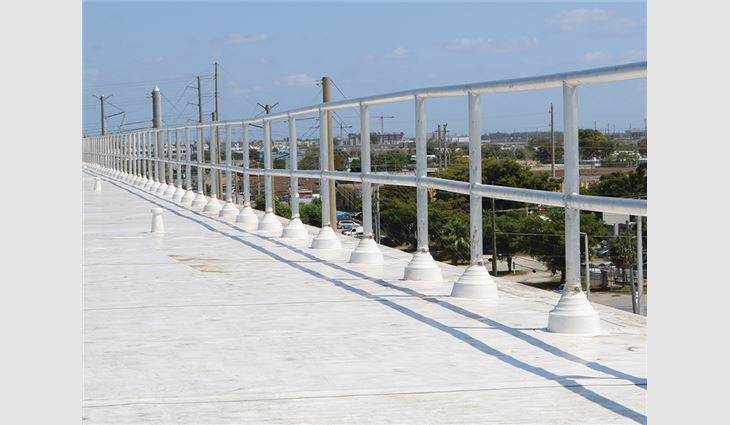 Advanced Roofing craftsmen designed and fabricated a custom aluminum safety rail system.