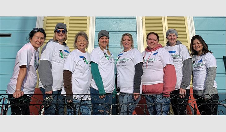 Volunteers helped renovate homes during Community Service Day.