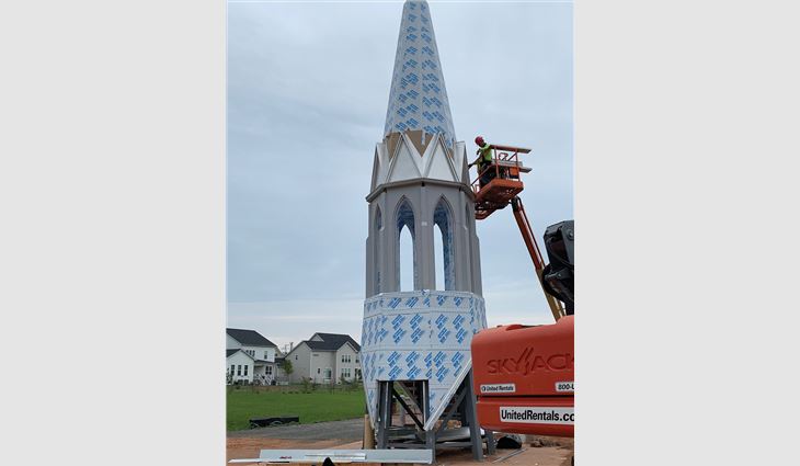A major part of the roofing project included a 57-foot-tall steeple.