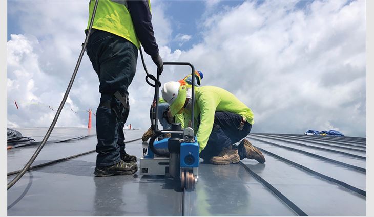 More than 29 miles of décor ribs were hot-air welded to the membrane to replicate the look of standing-seam metal.