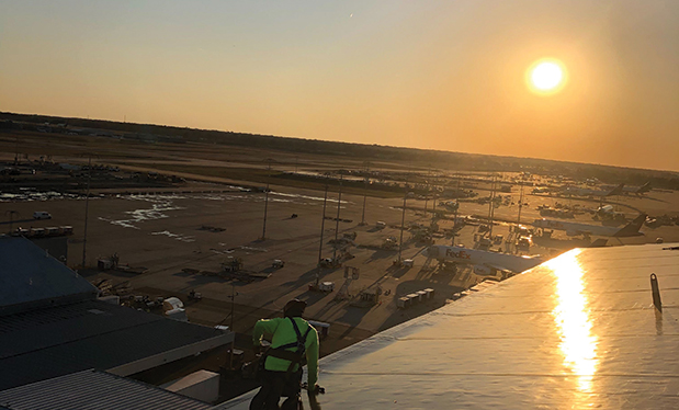 Roofing delivery - Ideal Building Solutions installs the roof system on a new FedEx® facility at Memphis International Airport