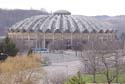 Treading lightly - Roofing workers reroof West Virginia University's domed coliseum 